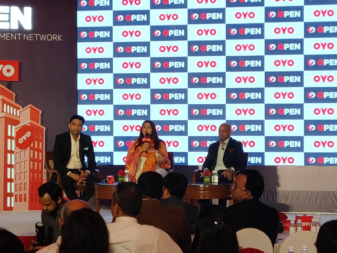 Ex.06 — OYO leadership panel discussion on stage at the OYO OPEN launch