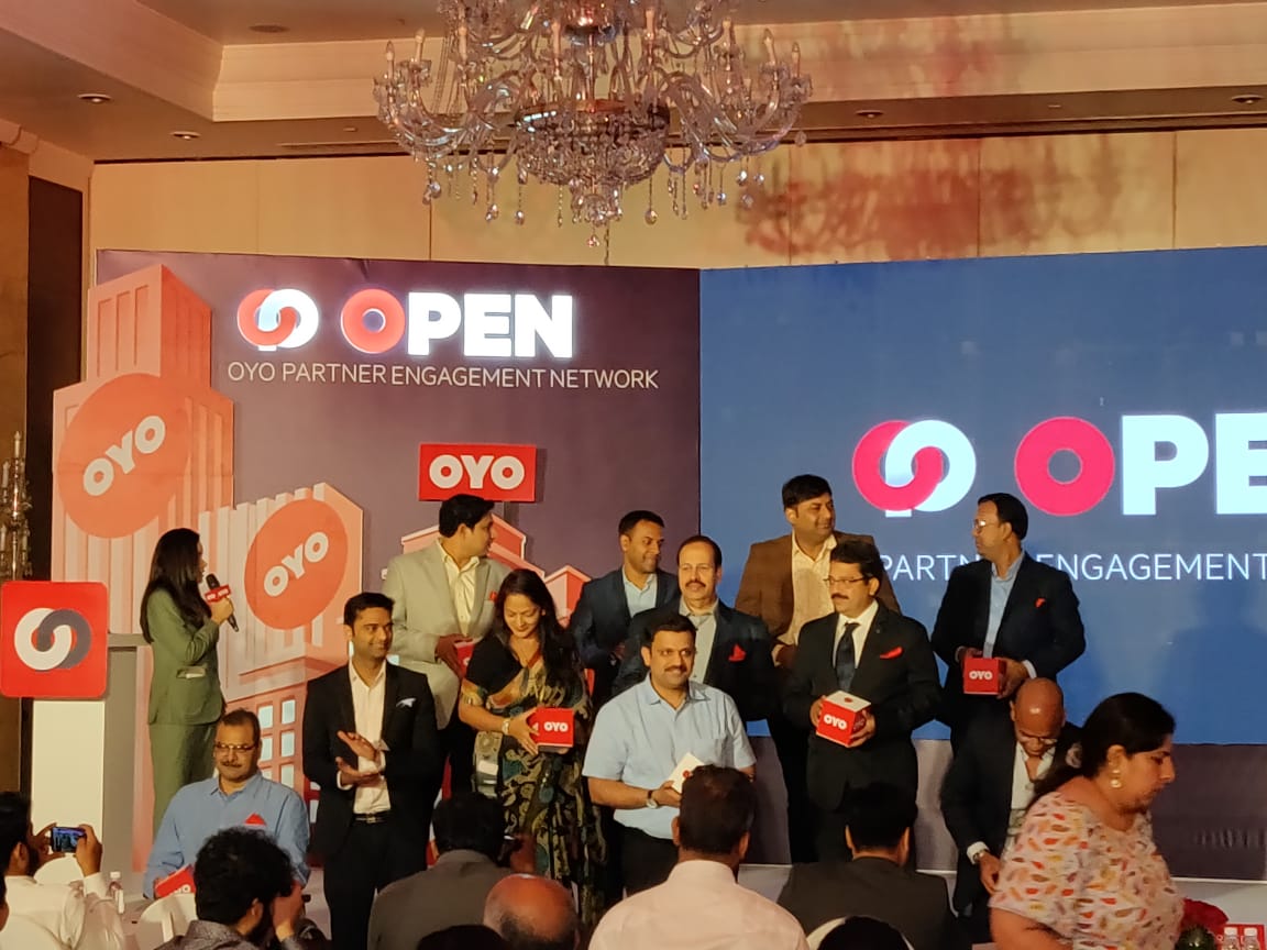 Ex.07 — OYO OPEN launch, leadership team on stage